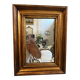 Miroir ancien en bois doré à la feuille