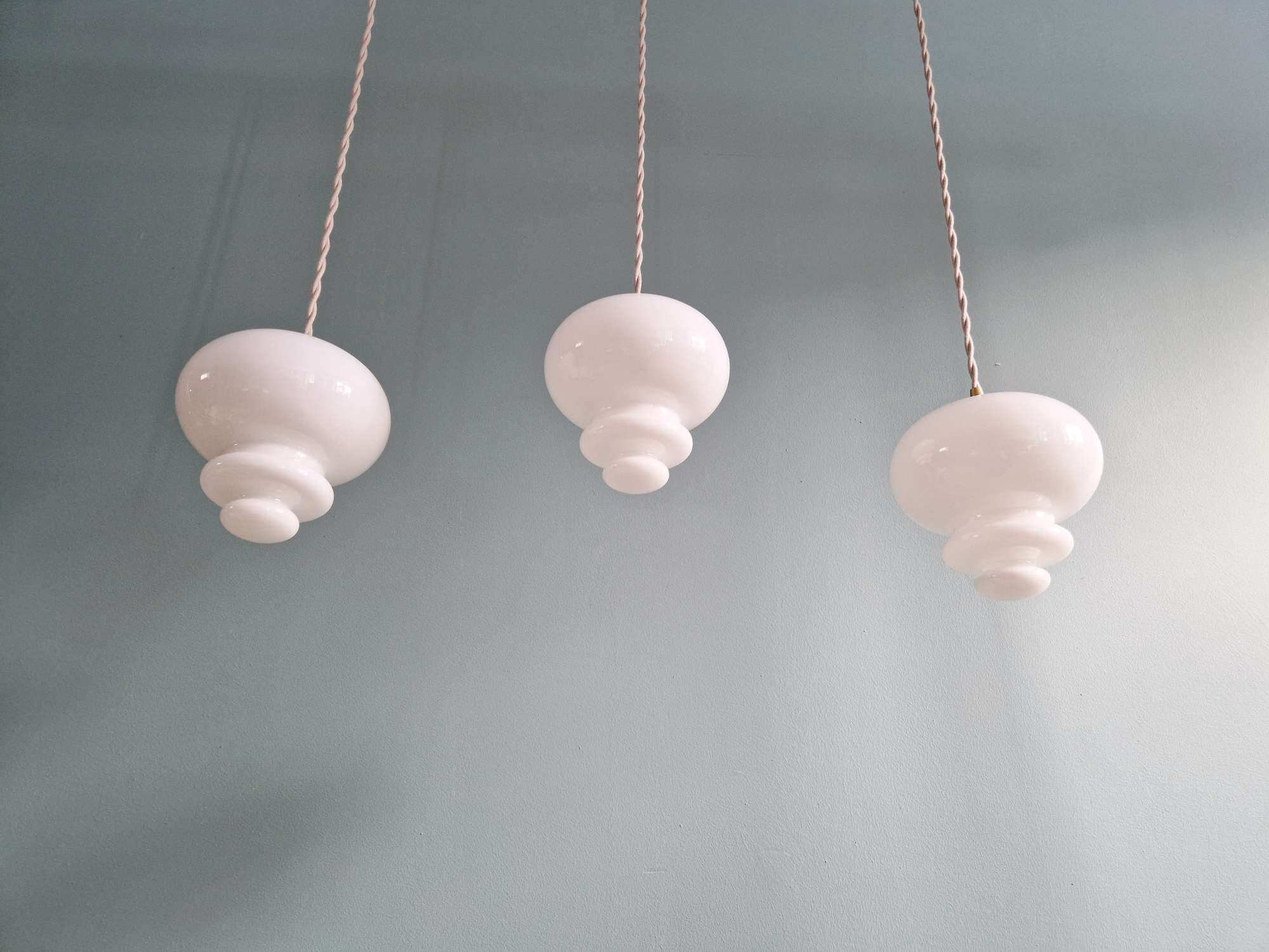 Scandinavian trio of suspensions in white opaline, 1960s