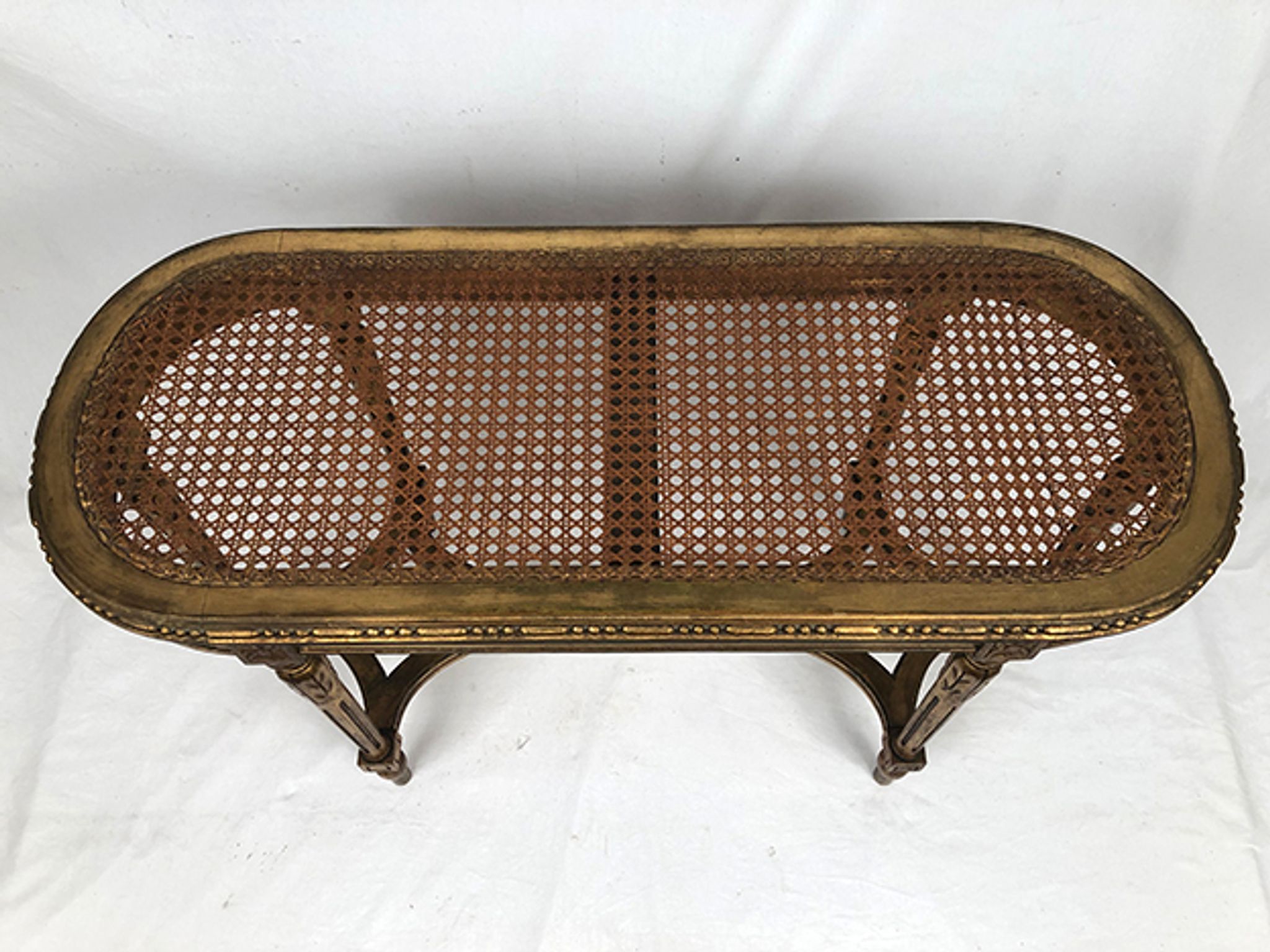 Banquette de piano de style Louis XVI bois doré foncé de canne