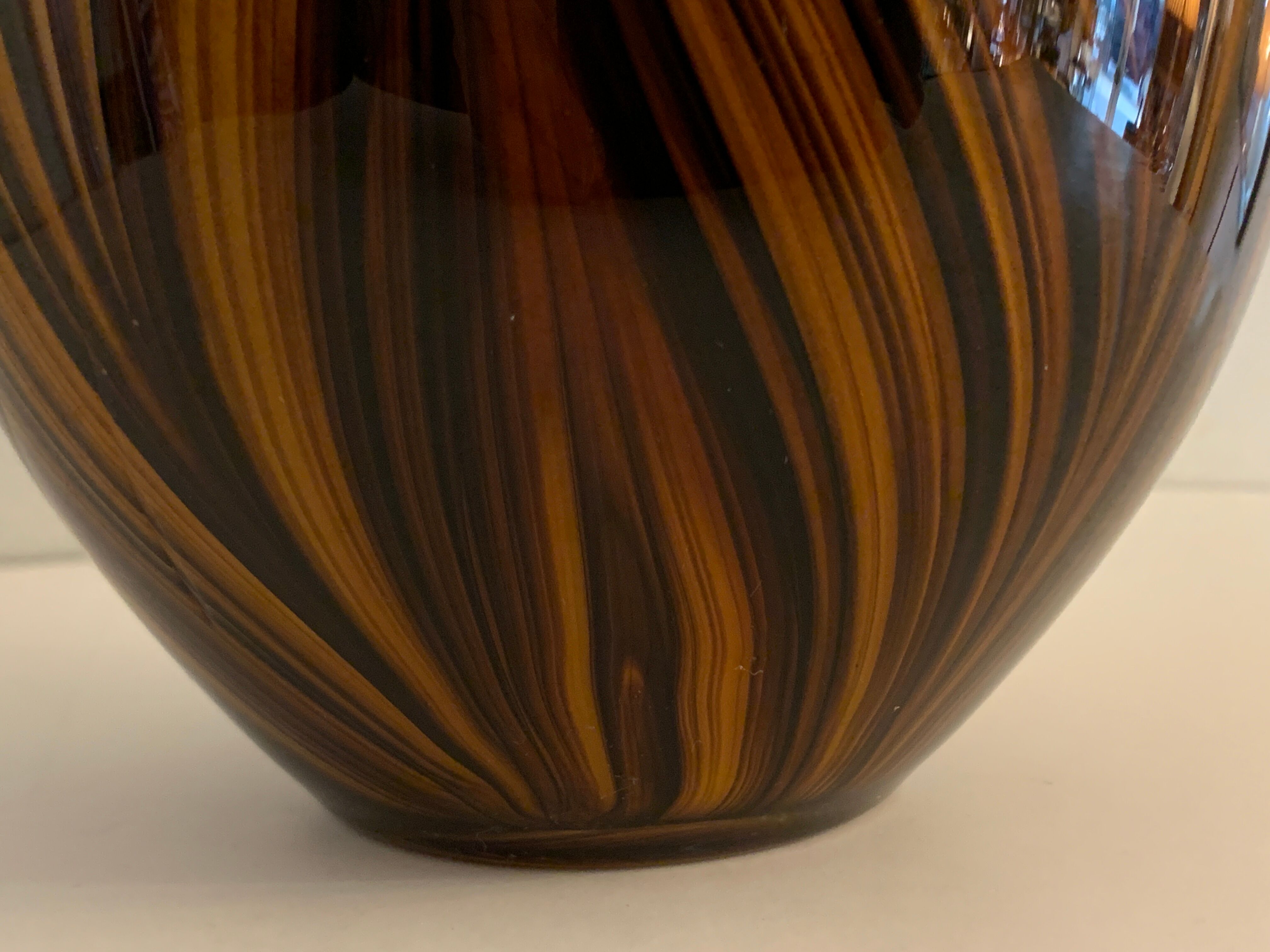 Yellow and black glass vase