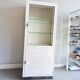 Vintage white industrial apothecary cabinet / display case