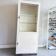 Vintage white industrial apothecary cabinet / display case