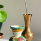 Vintage handcrafted ceramic and brass vases