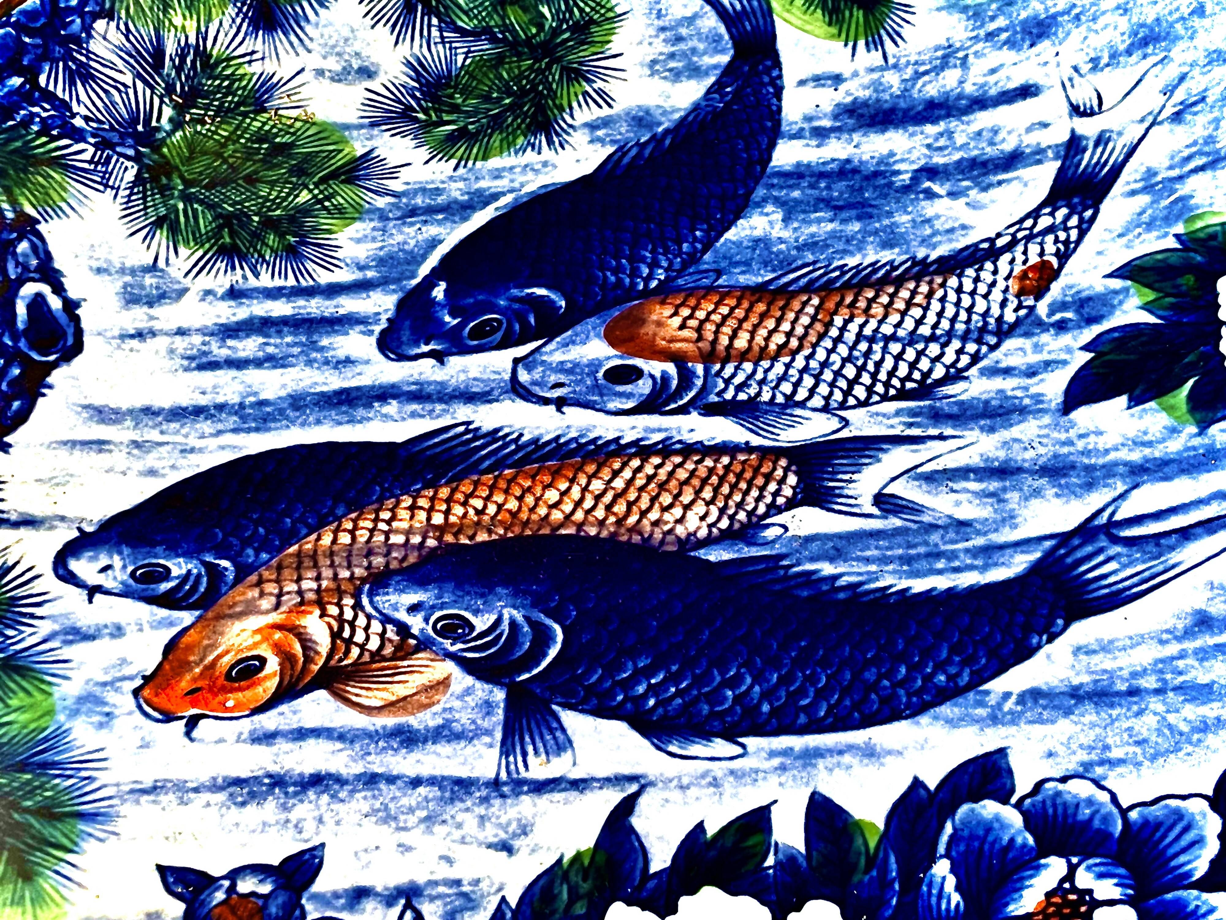 Decorative porcelain plate featuring a koi carp.