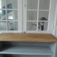 Vintage bookcase green of gray wooden top