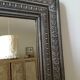 Antique patinated wood mirror