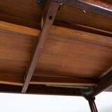 Dining table in rosewood with extensions from the 1960s