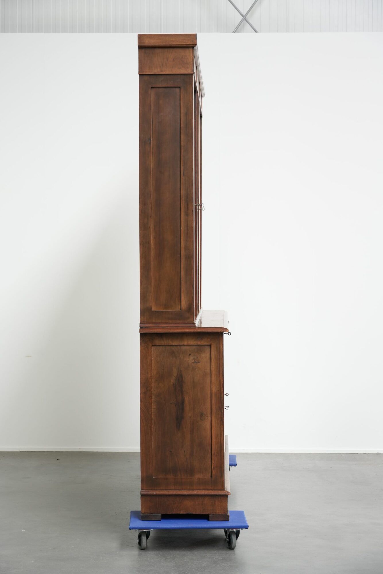 Antique English buffet/bookcase from the 19th century with original glass