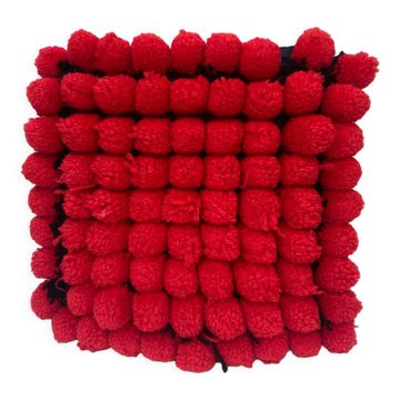 Coussin vintage pompons rouges