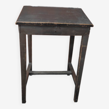 Old blackened wooden school desk