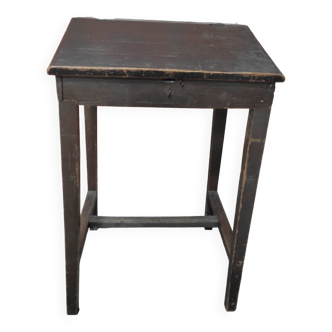 Old blackened wooden school desk