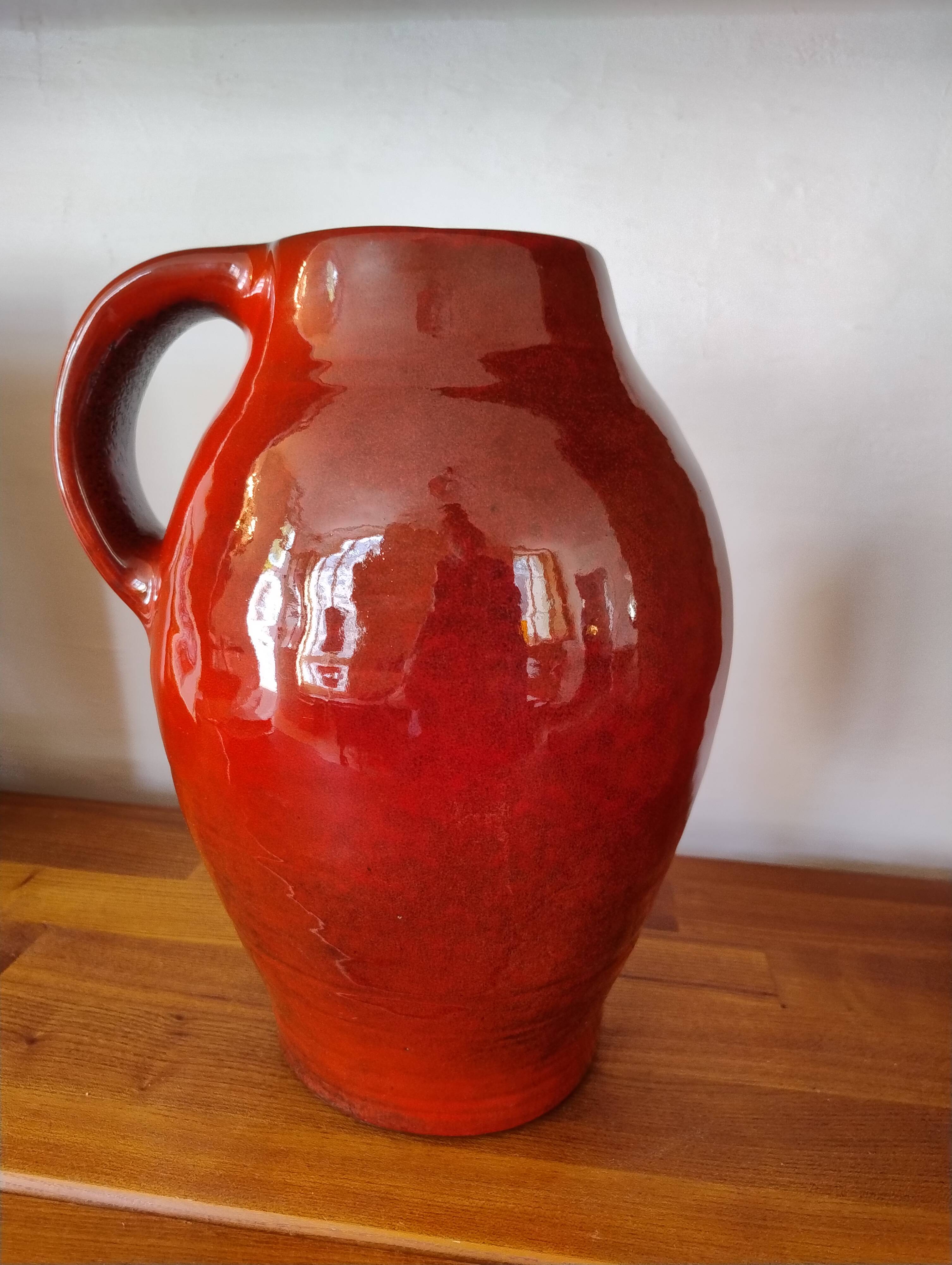 Large red jug or vase by Max Idlas