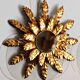 Miroir de forge et feuille d’or