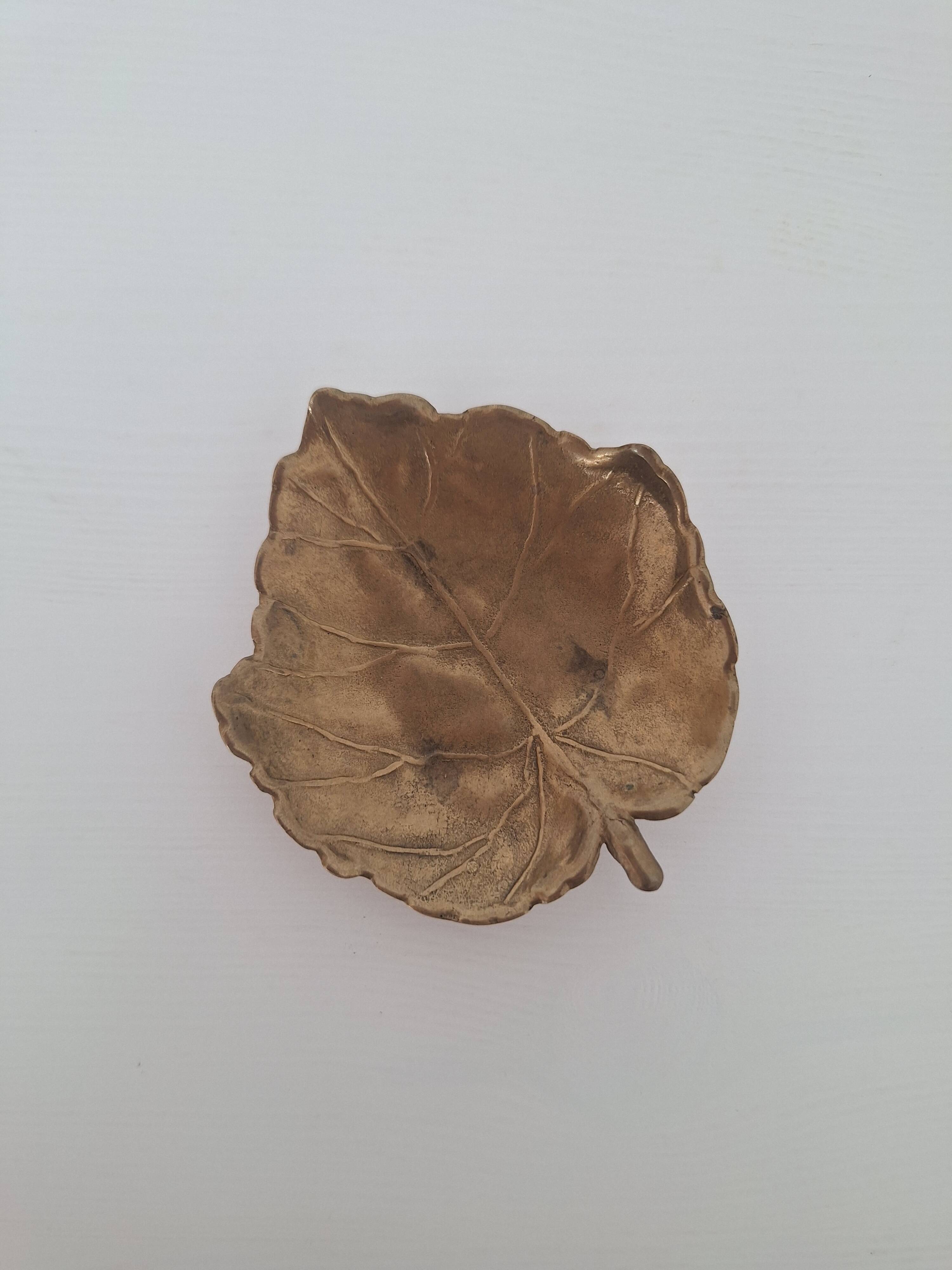 Vintage brass pocket emptier