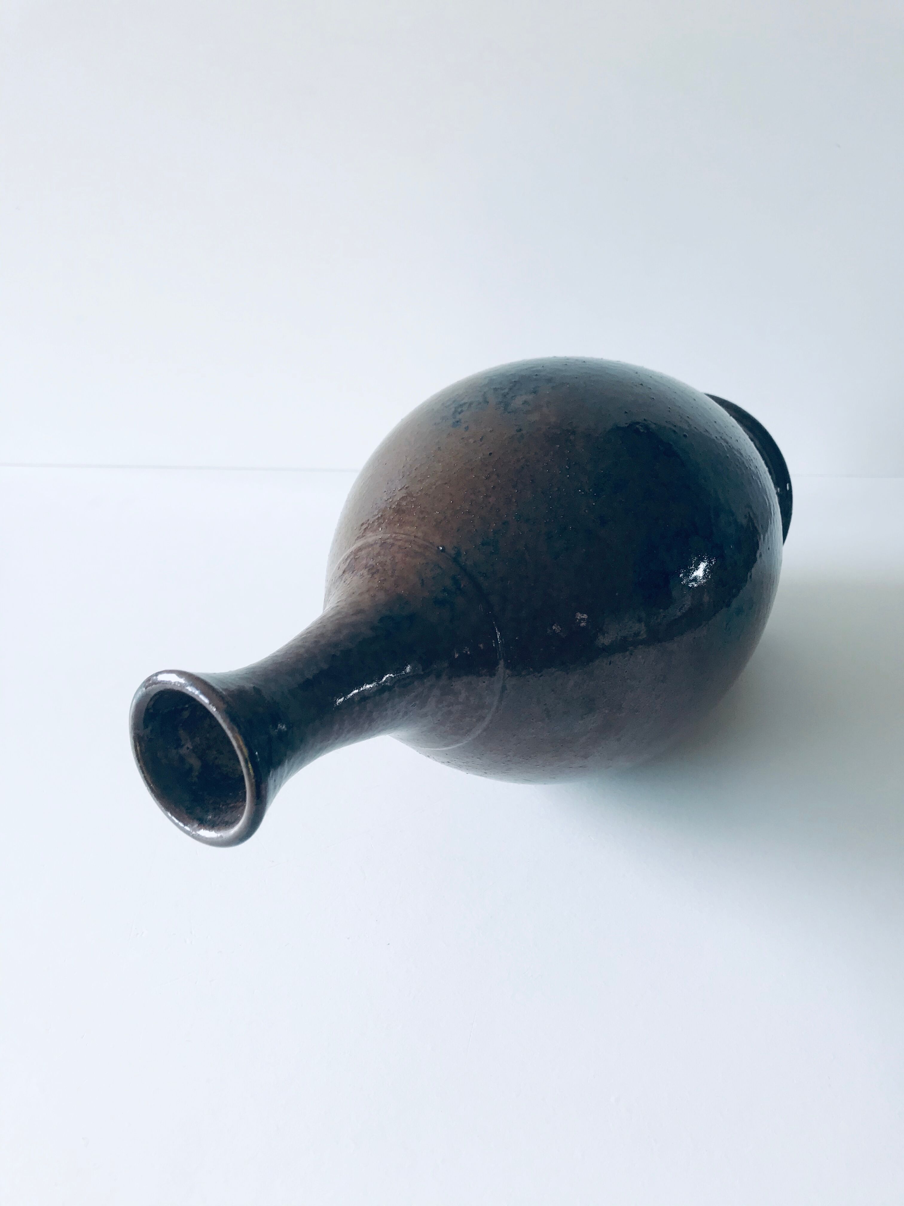 Enamelled sandstone vase