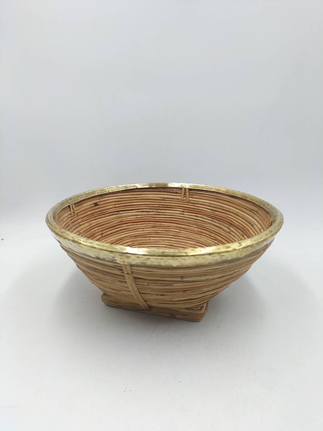 Rattan and brass basket