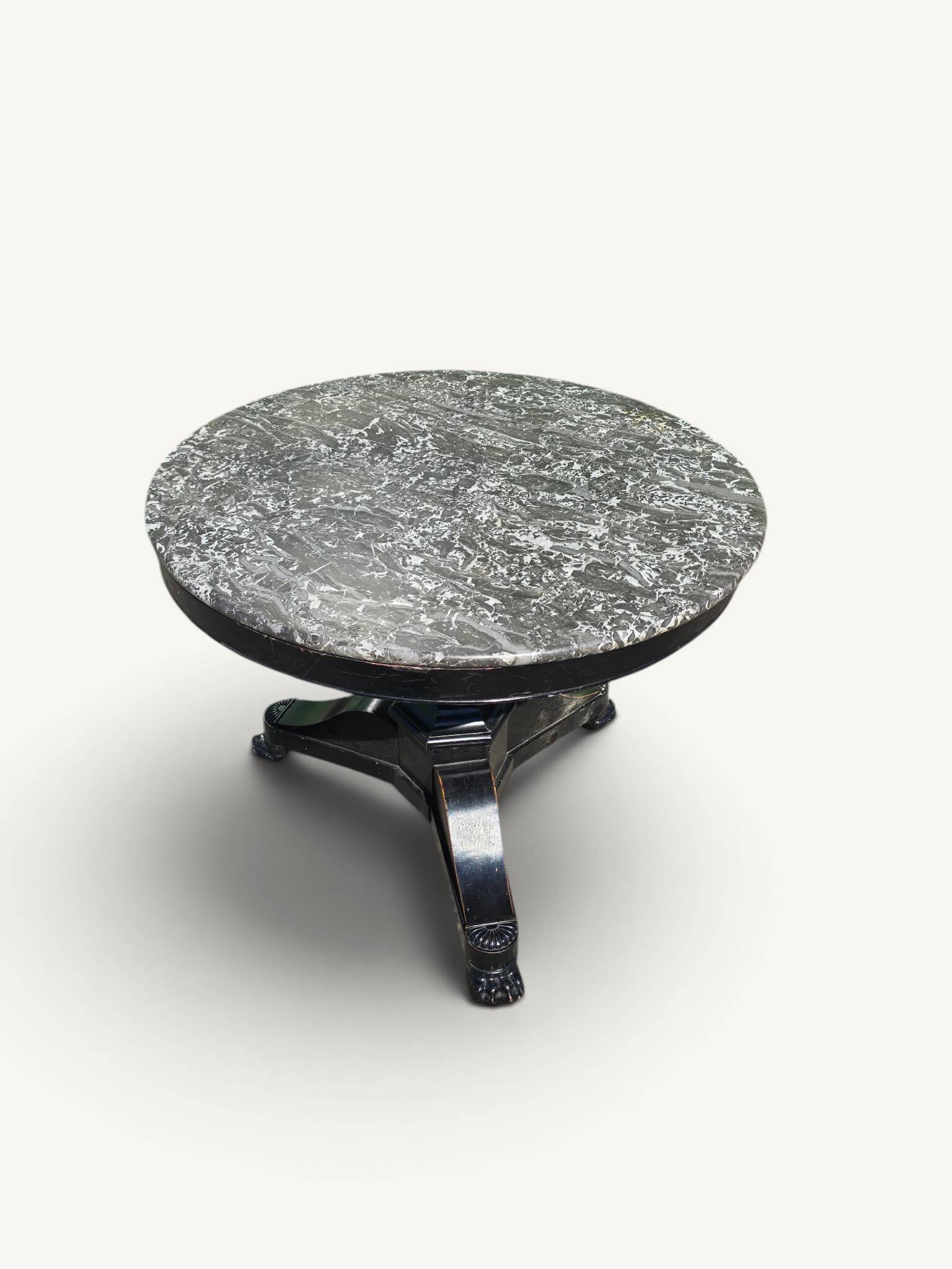 Empire dining table in blackened wood and grey marble, 19th century.