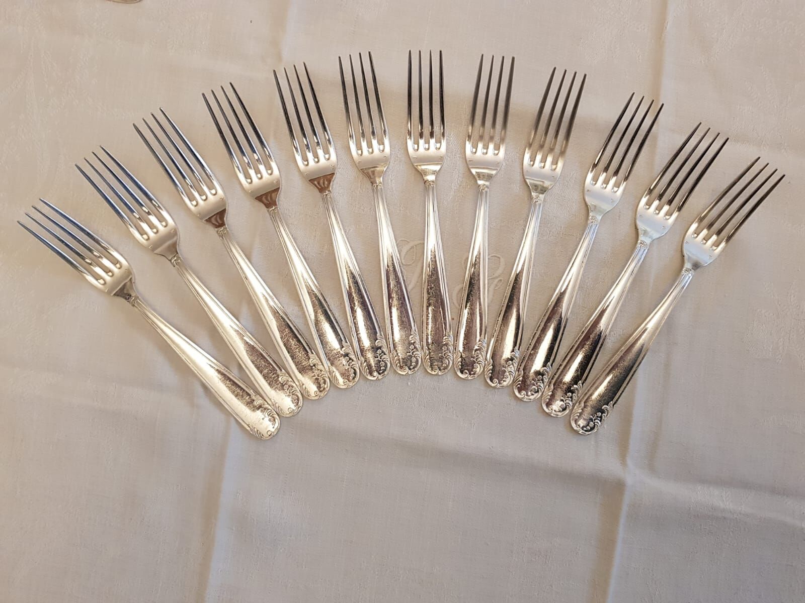 Silver cutlery set with 36 place settings and ladle