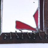 Brutalist mirror in metal and set glass