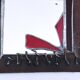 Brutalist mirror in metal and set glass