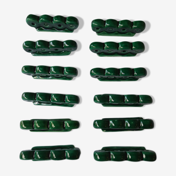 Complete series of 12 vintage emerald green glazed ceramic knife holders