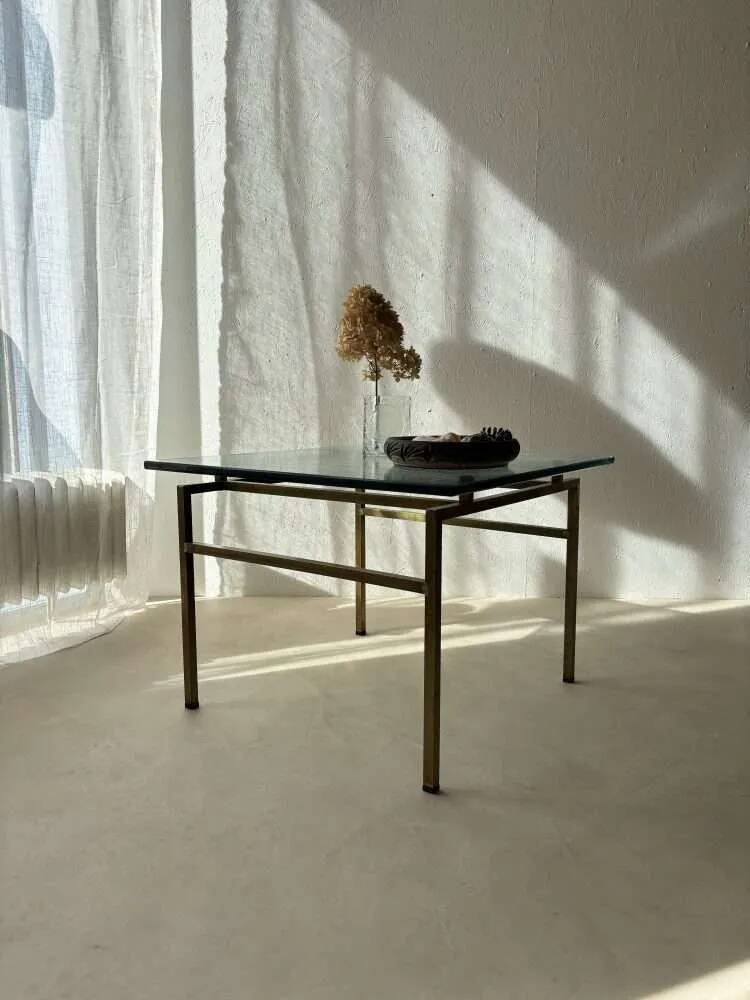 Swedish brass coffee table with a marbled glass top from the 1960s.