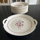 Service of 13 plates and a Badonviller dish