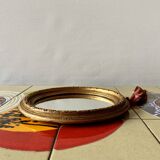 Small vintage wall mirror in gold painted wood