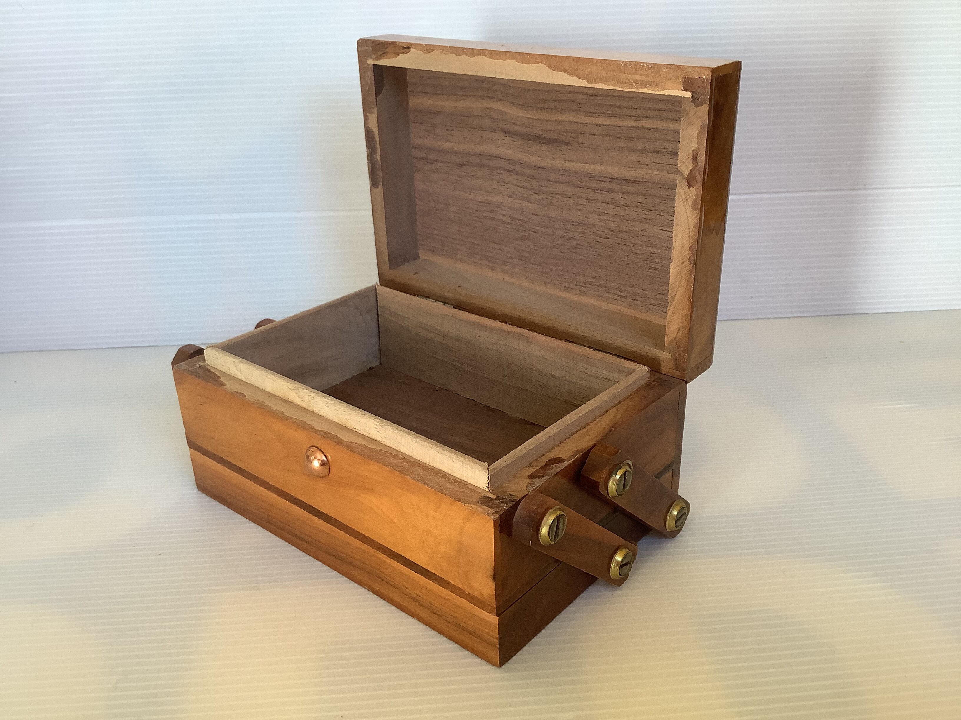 Old wooden cigarette box and ashtray