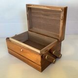 Old wooden cigarette box and ashtray