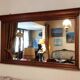 Large wall mirror in Louis-Philippe style made of solid wood.