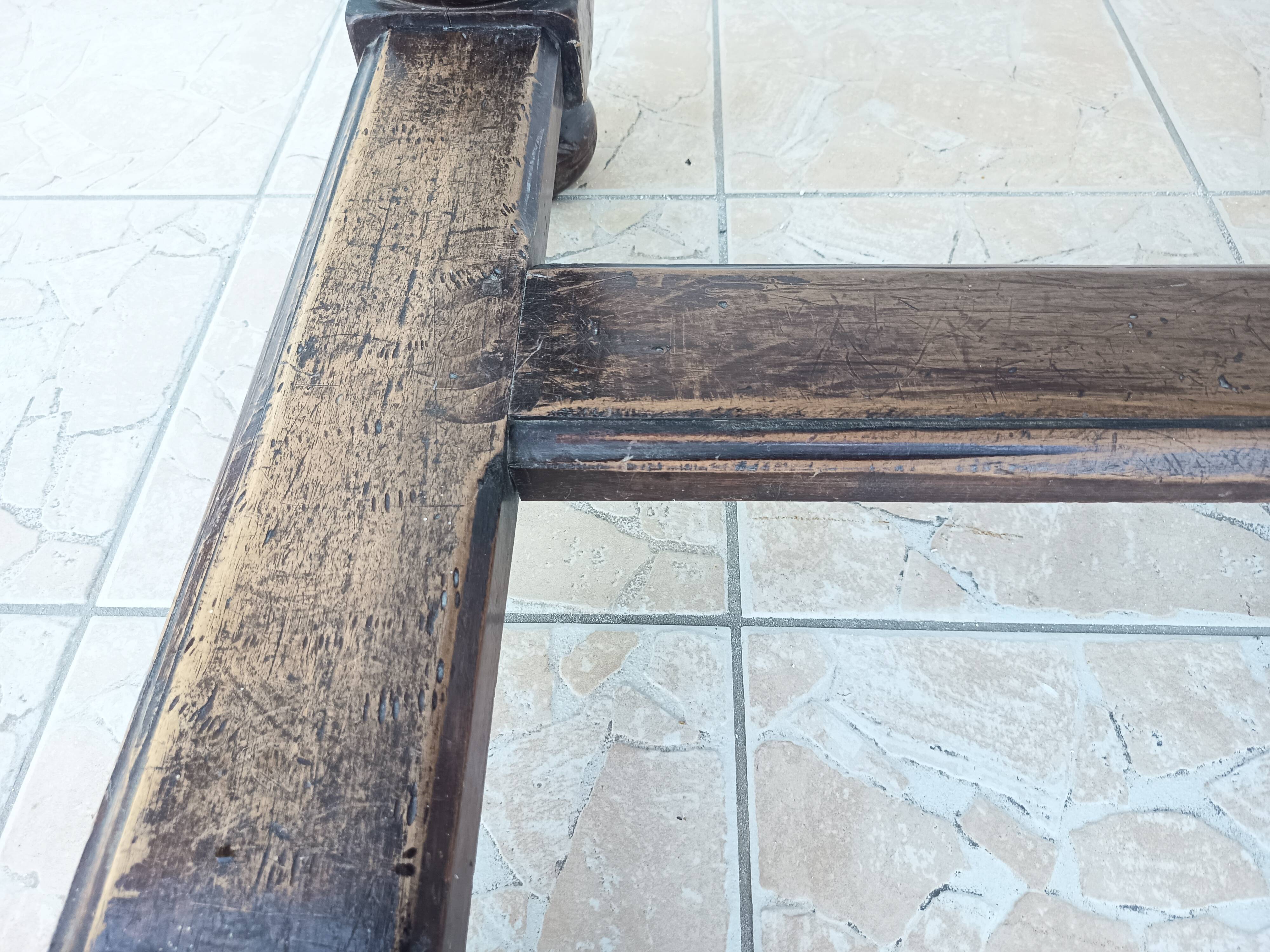 Louis XIII walnut table from the 19th century.