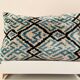 Ikat cushion in blue and black velvet