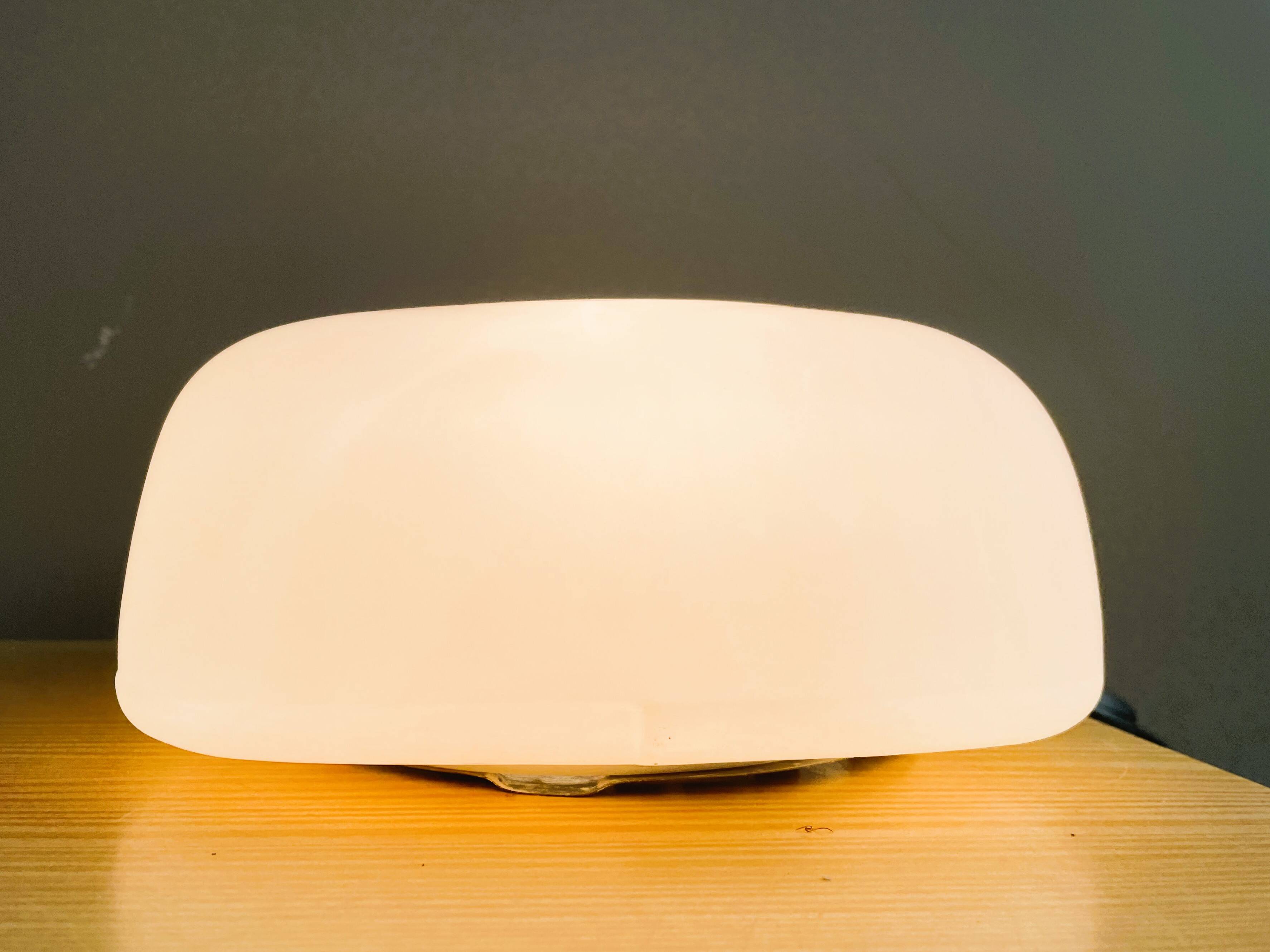Minimalist white opaline glass flush mount pill lamp