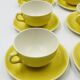 Set of 8 Vintage Boch Frères Yellow Cups and Saucers