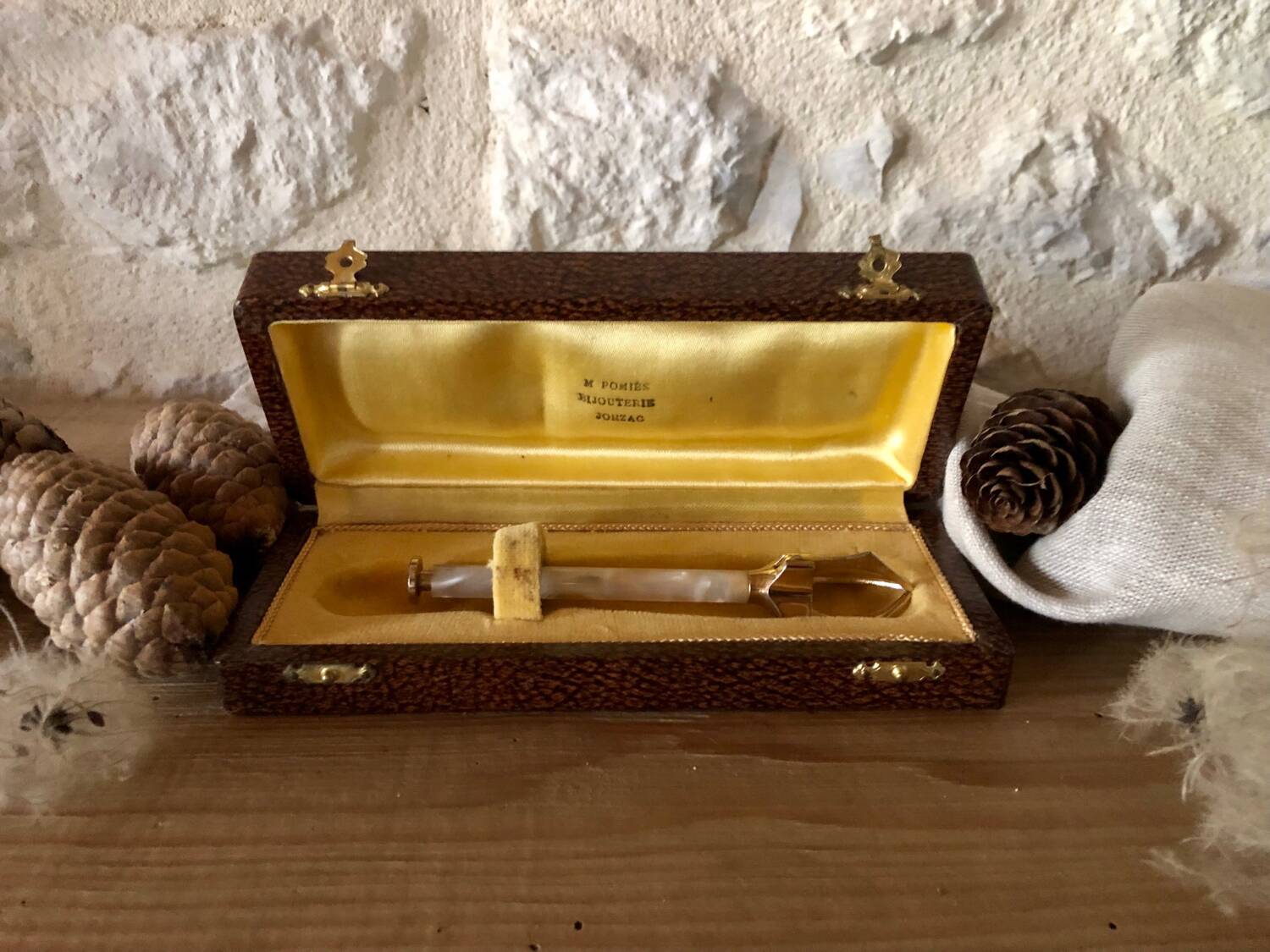 Sugar or ice tongs in their case