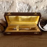 Sugar or ice tongs in their case