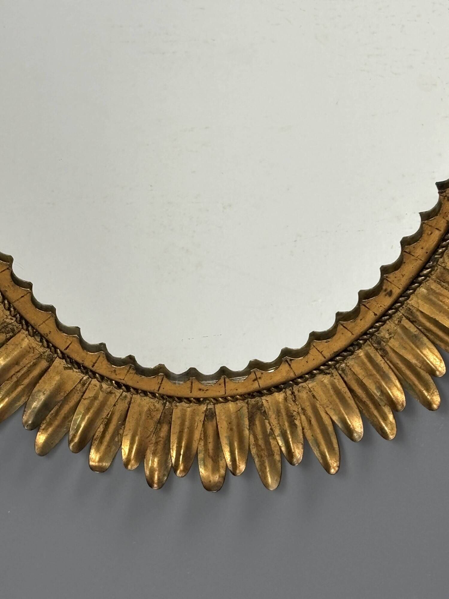 Midcentury bohemian Hollywood Regency Spanish gilt metal sun mirror, 1960s