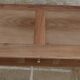 Console in solid walnut with a natural finish, featuring three drawers with a belt.