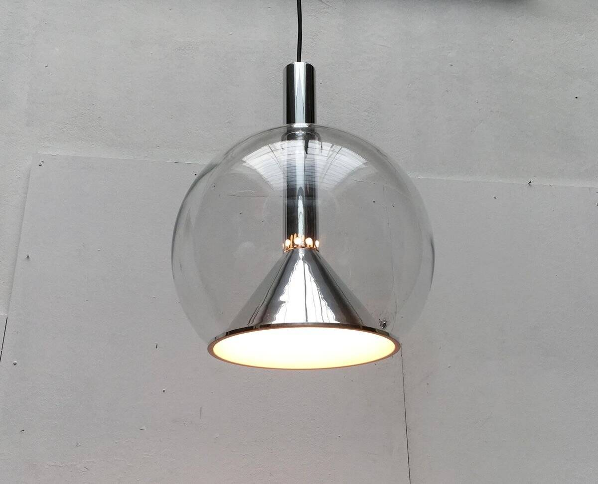 Suspended globe lamp in glass from the German space age by Erco.