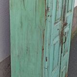Old wooden cabinet with beautiful green patina