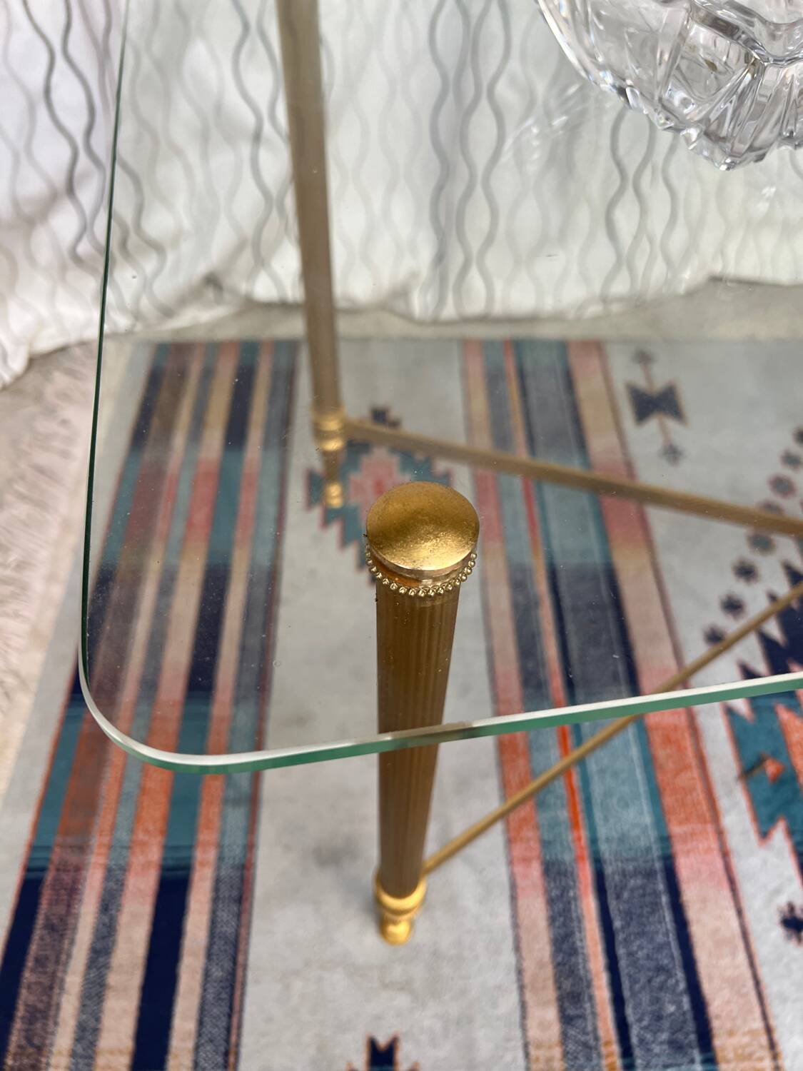 Vintage gold coffee table. Glass top.