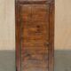 Large vintage hardwood furniture in military country style.