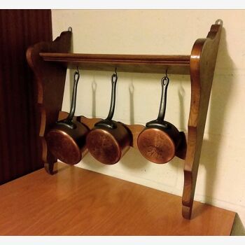 Shelf with copper pans