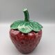 Condiment jar mustard jam in the shape of strawberry