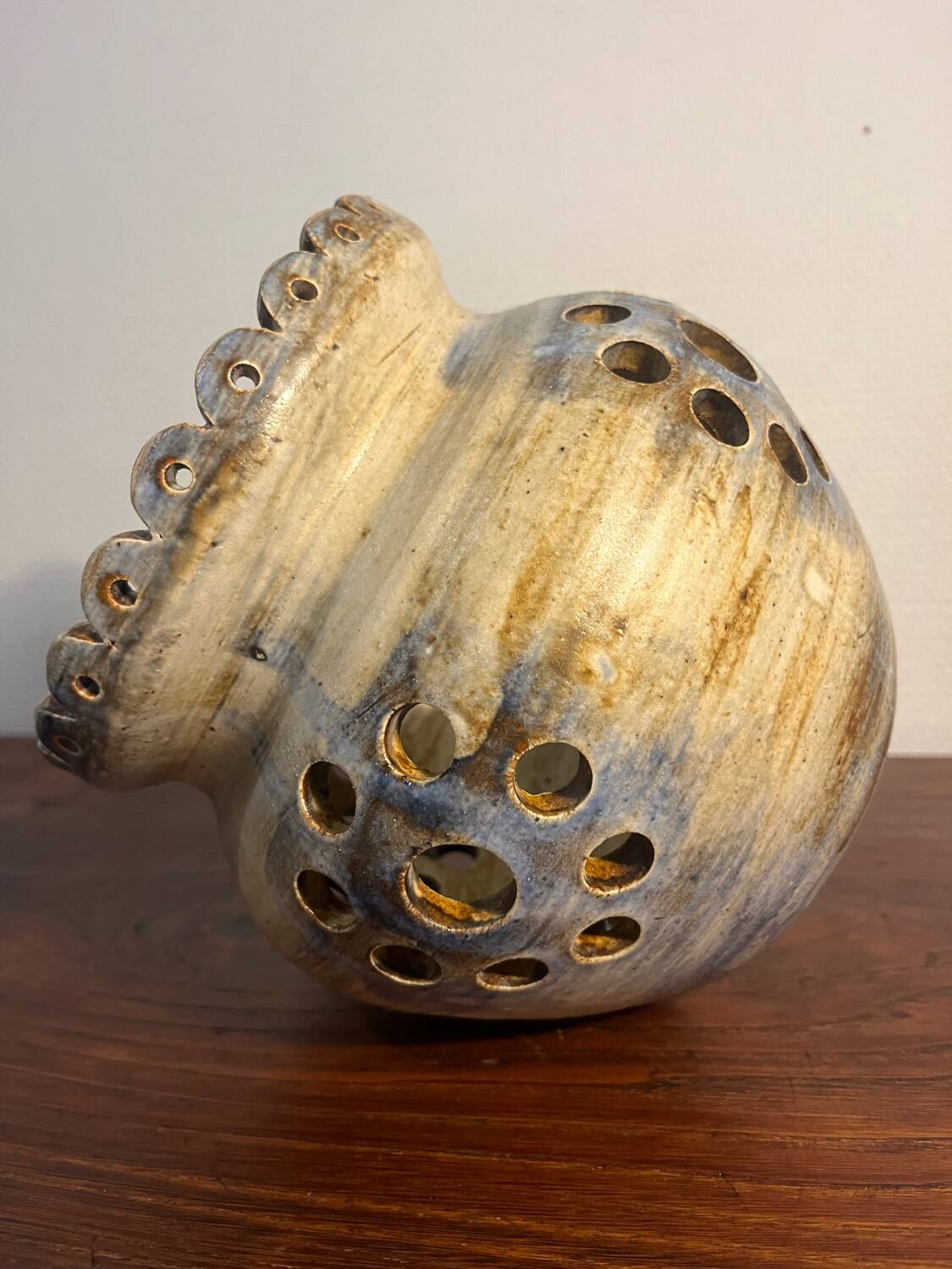 Ceramic suspension with openings