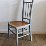 Low chair in wood and canework