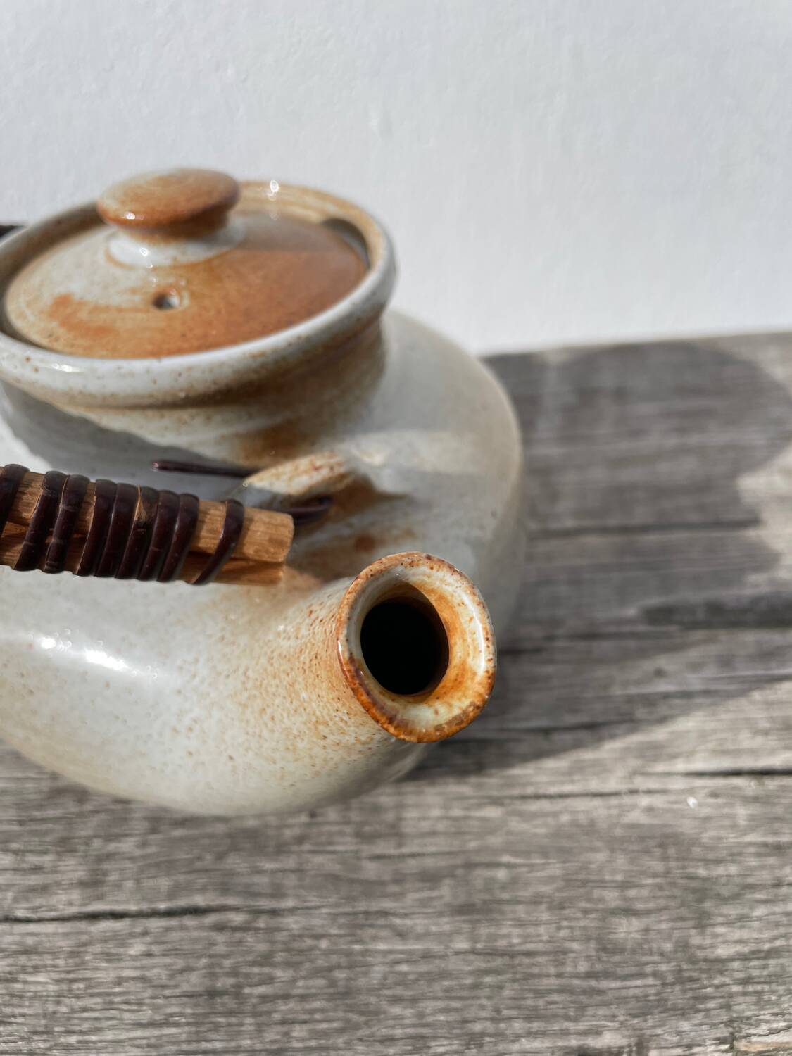 Grand Feu ceramic stoneware and rattan teapot