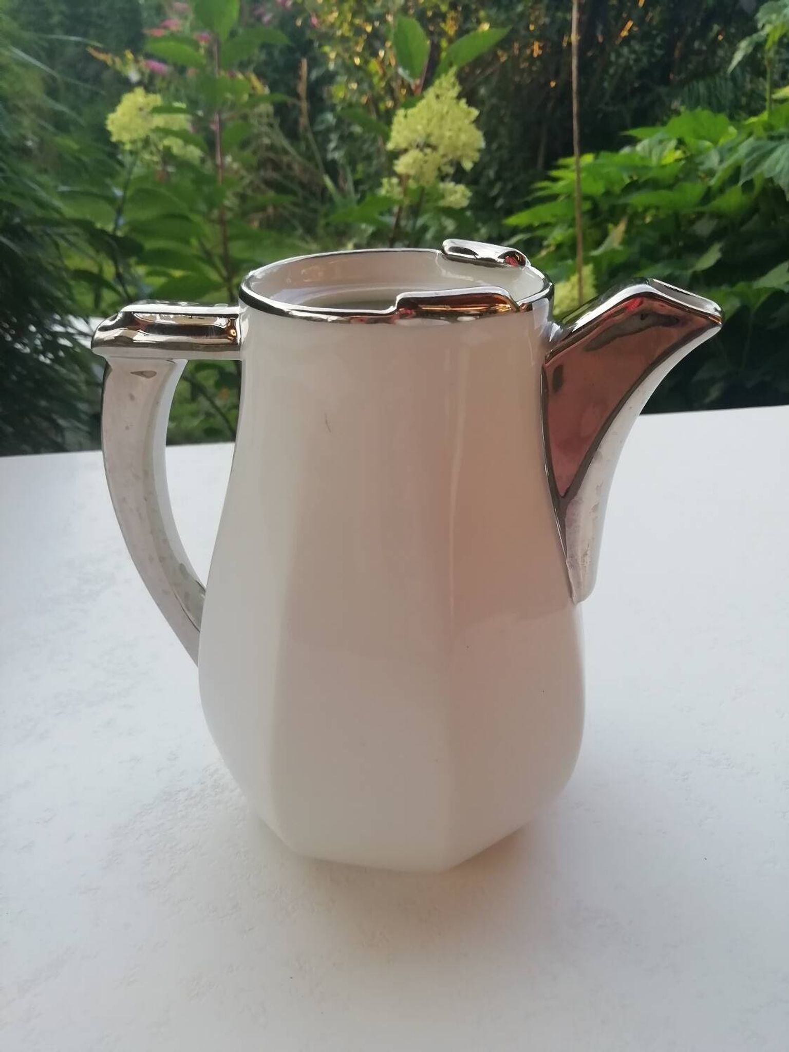 Pair of milk jug teapots