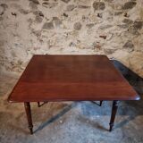 Antique English drop-leaf table in mahogany, late 19th century.